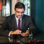 a man holding a smartphone