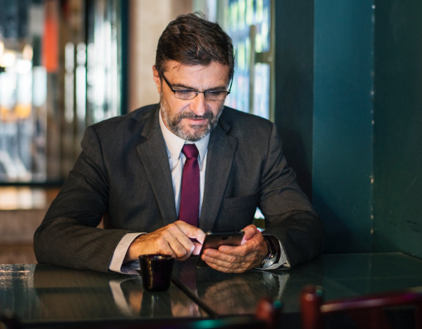 a man holding a smartphone